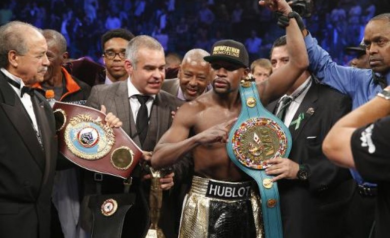 Las Vegas (Etats-Unis) (AFP). Boxe: Mayweather remporte le combat du siècle et touche le jackpot