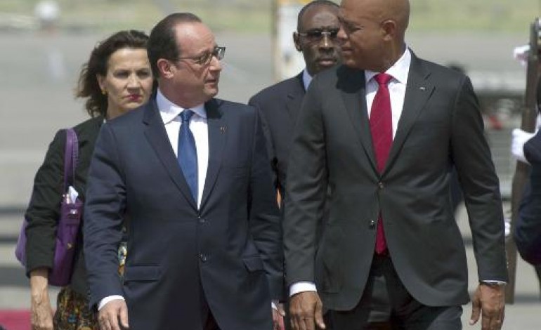 Port-au-Prince (AFP). Hollande en Haïti sur fond de polémique sur l'acquittement de la dette