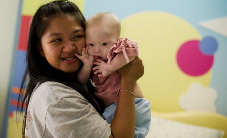 Sydney (AFP). Australie: controverse autour des dons à un bébé né par GPA et abandonné