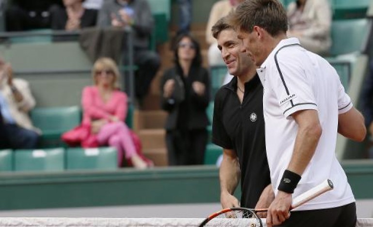Paris (AFP). Roland-Garros: Simon en 8e en sortant un Mahut batailleur