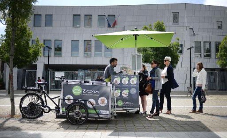 Nantes (AFP). Les Boîtes à vélo, un collectif nantais d'entrepreneurs à bicyclette