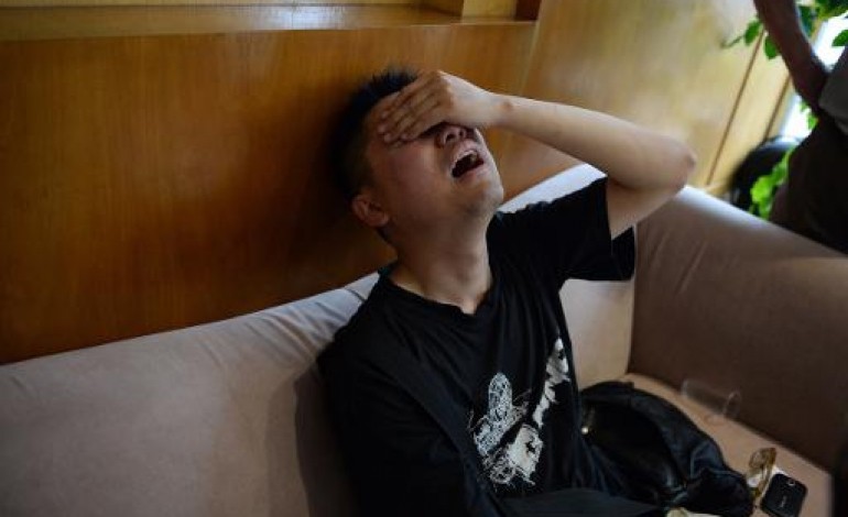 Pékin (AFP). Chine: scènes de désespoir à Shanghai après le naufrage sur le Yangtsé