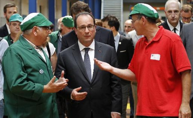 Gémenos (France) (AFP). Hollande en visite surprise chez les ex-Fralib, donne des signes à la gauche