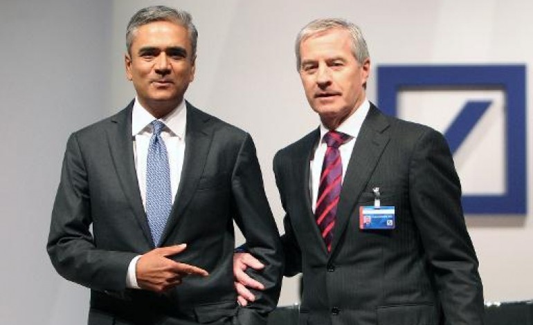 Francfort (AFP). Les 2 patrons de Deutsche Bank Anshu Jain et Jürgen Fitschen jettent l'éponge