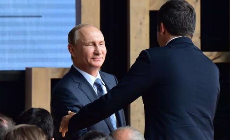 Milan (AFP). Poutine en Italie déplore les sanctions, Renzi insiste sur Minsk