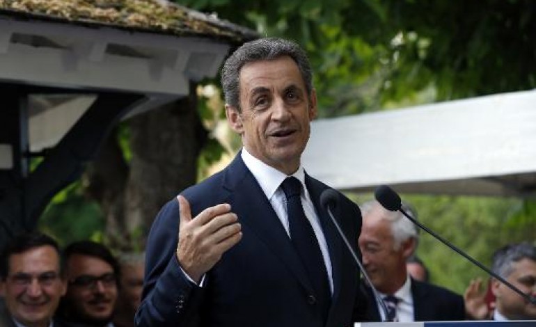 Paris (AFP). Sarkozy critiqué pour sa saillie sur les migrants 