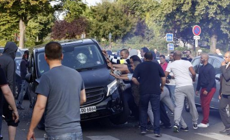 Paris (AFP). UberPOP: le gouvernement tente d'apaiser les taxis après une mobilisation émaillée de violences