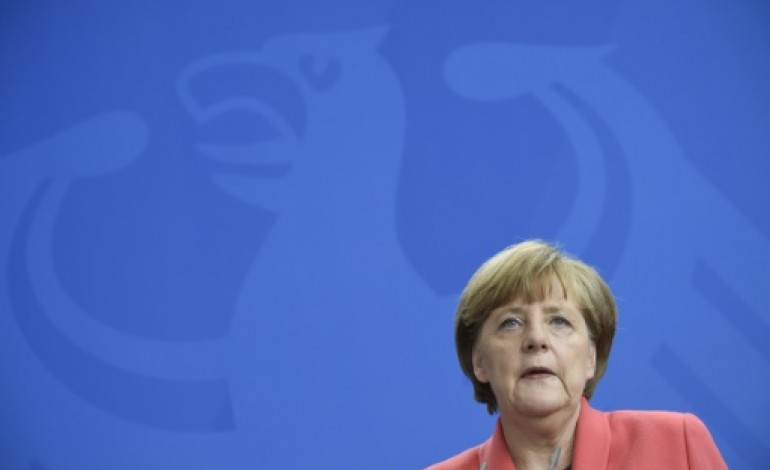 Berlin (AFP). Merkel prête à de nouvelles négociations avec la Grèce après le référendum