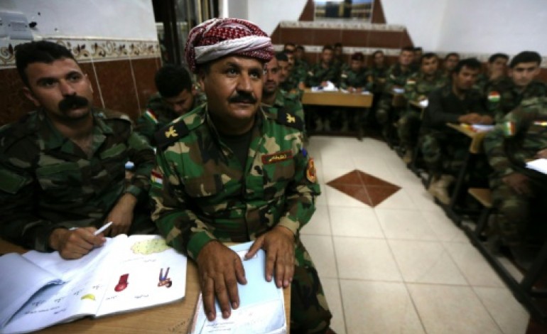 Bahra (Irak) (AFP). En Irak, apprendre à lire et à écrire sur la ligne de front