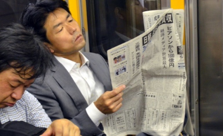 Tokyo (AFP). Rachat du FT par le Nikkei: pari international audacieux, choc culturel garanti