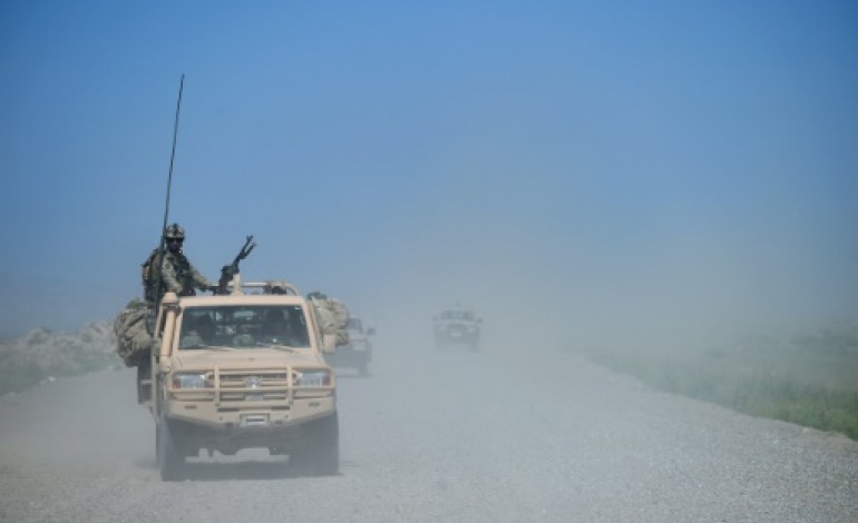 Kunduz (Afghanistan) (AFP). Afghanistan: plus de 100 policiers se rendent aux talibans