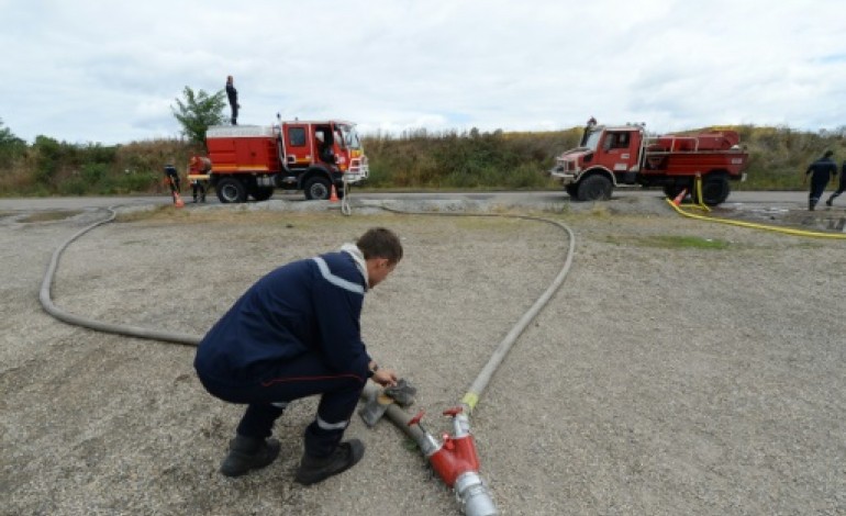 Saint-Jean-d'Illac (France) (AFP). Gironde: nette amélioration sur le front du feu, premiers retours d'évacués, allègement en vue