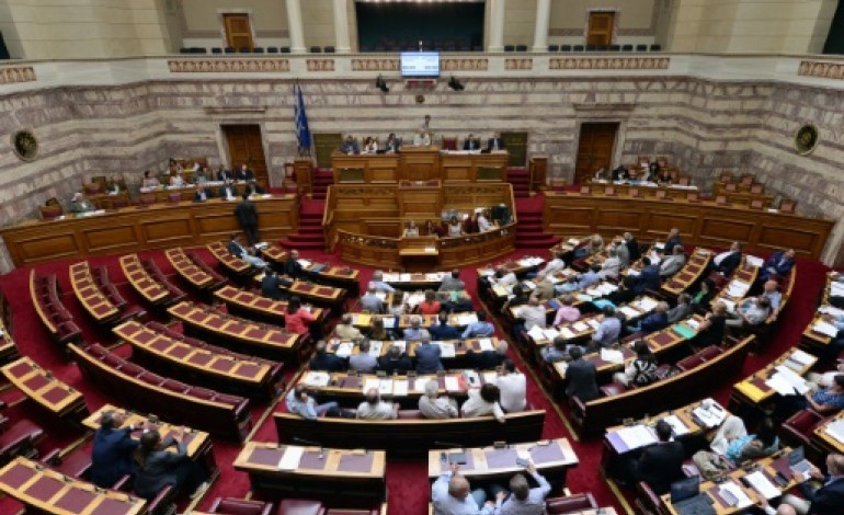 Athènes (AFP). Les députés grecs examinent la nouvelle aide au pays qui divise en Grèce et en Europe