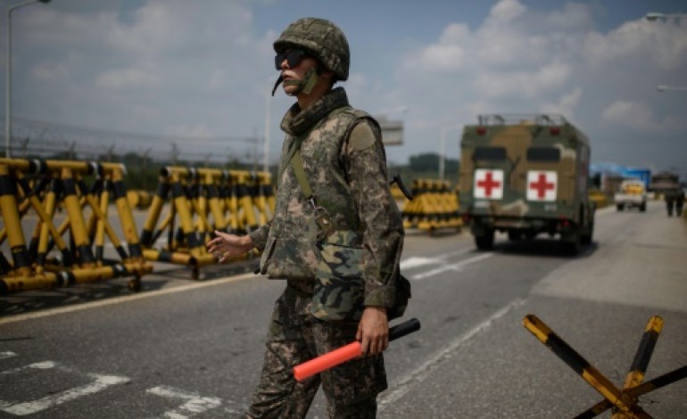 Panmunjom (Corée du Sud) (AFP). Les deux Corées acceptent de négocier, la menace d'une confrontation s'éloigne