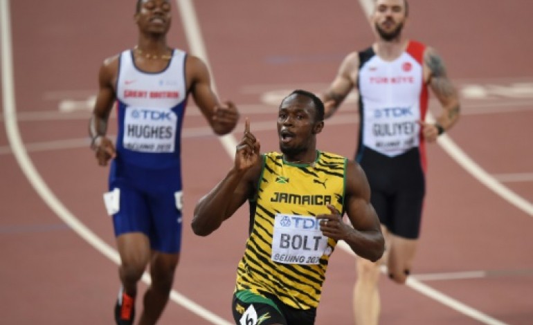 Pékin (AFP). Mondiaux d'athlétisme: le Jamaïcain Usain Bolt champion du monde sur 200 m