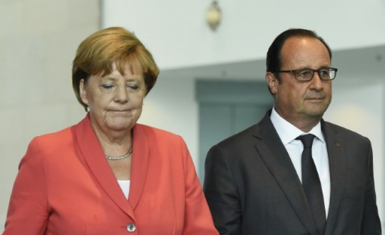 Paris (AFP). Migrants: Hollande et Merkel ont décidé de transmettre dès aujourd'hui des propositions communes à l'UE 