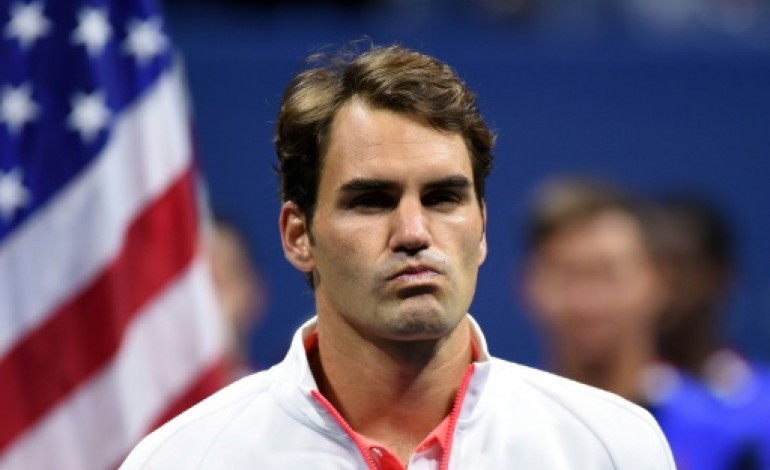 New York (AFP). US Open: Federer prend son mal en patience