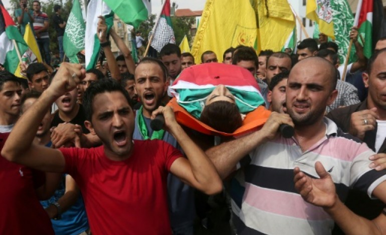 Ramallah (Territoires palestiniens) (AFP). Cisjordanie: un jeune Palestinien tué, Israël va durcir la répression