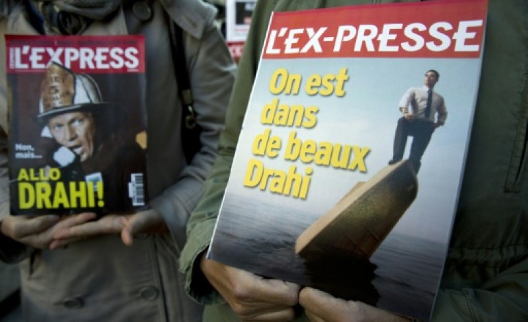 Paris (AFP). Motion de défiance, départ d'une plume: la situation se tend à L'Express
