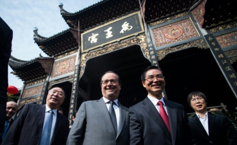 Chongqing (Chine) (AFP). Hollande en Chine pour deux jours, la COP21 en ligne de mire