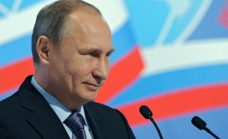 Paris (AFP). Le président russe Vladimir Poutine présent à Paris pour le sommet climat