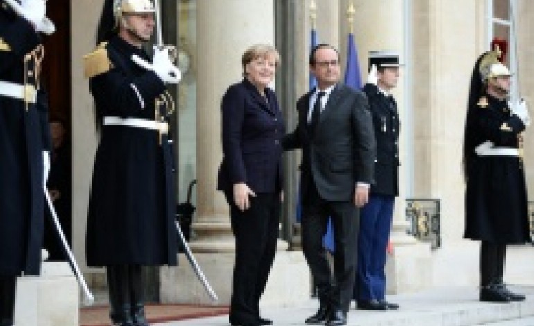 Paris (AFP). Lutte contre le groupe Etat islamique: Hollande sollicite l'aide de Merkel