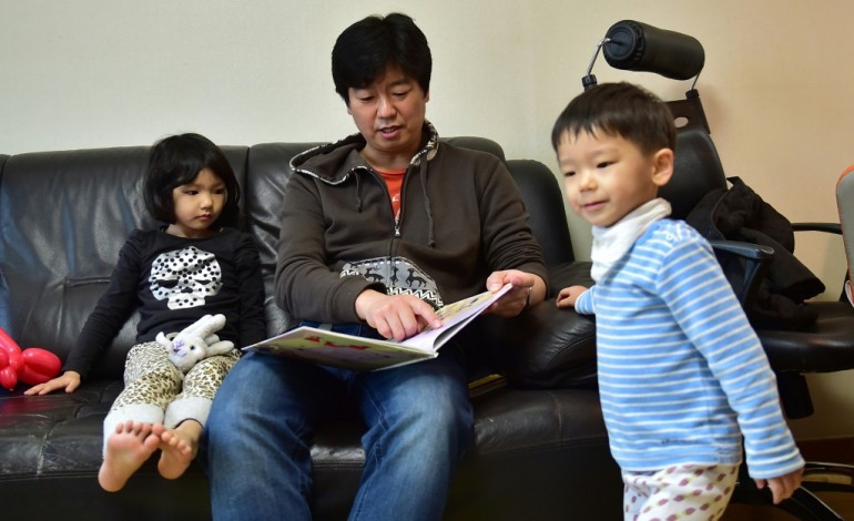 Séoul (AFP). Des pères osent l'impensable en Corée du Sud: rester au foyer
