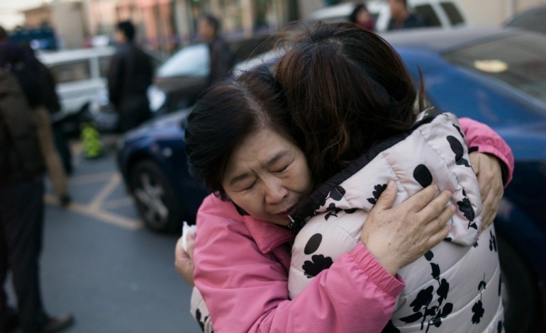Pékin (AFP). MH370: des familles chinoises déposent plainte contre la compagnie
