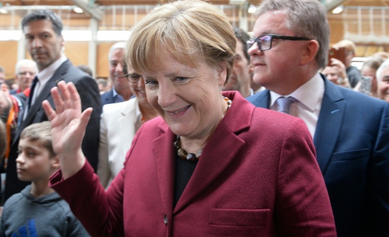 Berlin (AFP). Allemagne: régionales à risques pour Merkel avec les populistes en embuscade