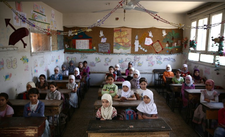 Hassaké (Syrie) (AFP). Privés d'école par l'EI, des élèves syriens ravis de passer leurs examens
