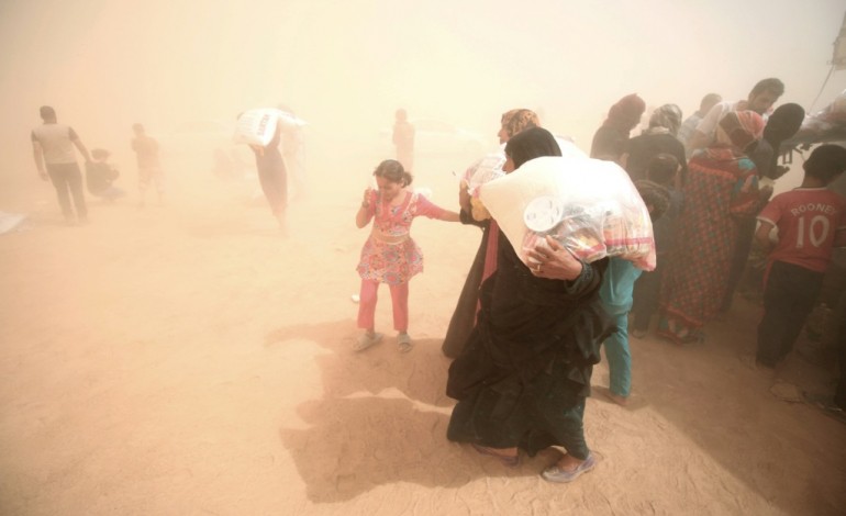 Habbaniyah (Irak) (AFP). Les déplacés irakiens de Fallouja d'un enfer à un autre