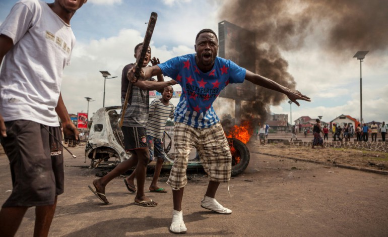 Kinshasa (AFP). RDCongo: violences mortelles et pillages à Kinshasa, manifestation d'opposition interdite