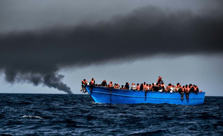 A bord de l'Astral (Italie) (AFP). Environ 6.055 migrants secourus en mer et 9 morts, 3 ans après le naufrage de Lampedusa 