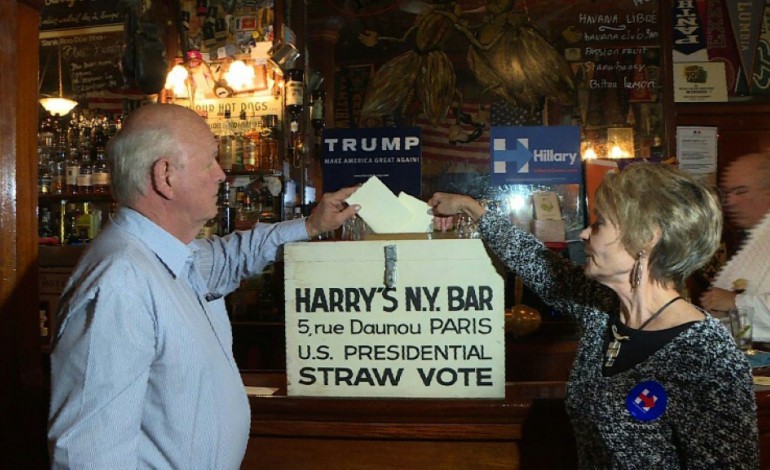 Paris (AFP). Au Harry's Bar à Paris, les Américains votent déjà
