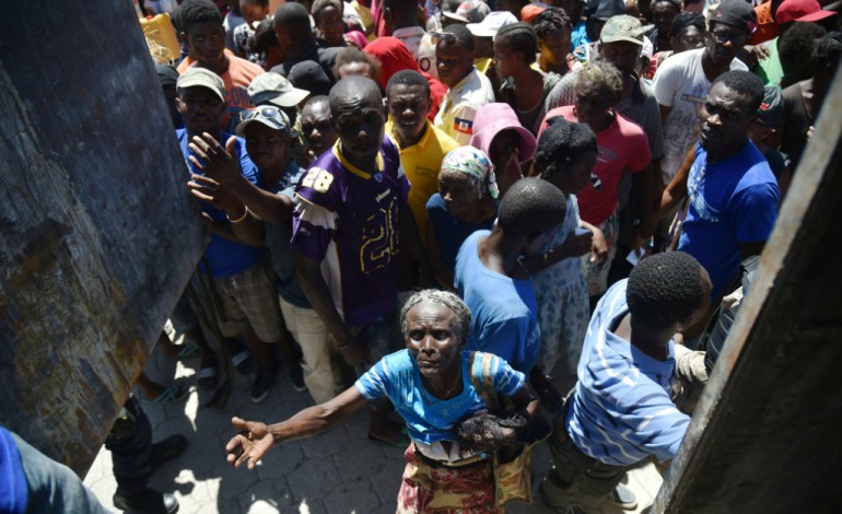 Zorangé (Haiti) (AFP). Les Haïtiens reconstruisent en attendant une aide qui s'organise