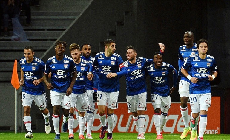 Ligue 1: Lyon, au pied du podium, en s'imposant à Lille