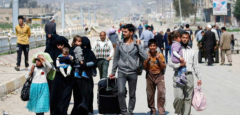 Fuir ou revenir, le chassé-croisé des déplacés à Mossoul