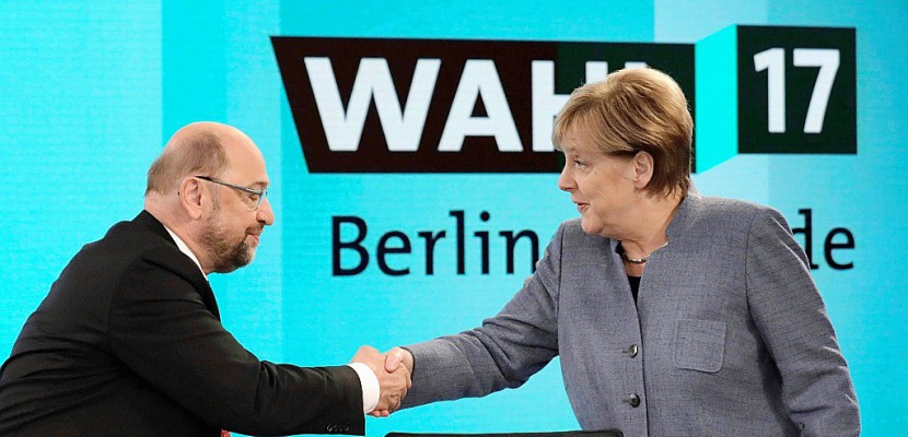 Allemagne: Merkel tente de rallier les sociaux-démocrates à un gouvernement