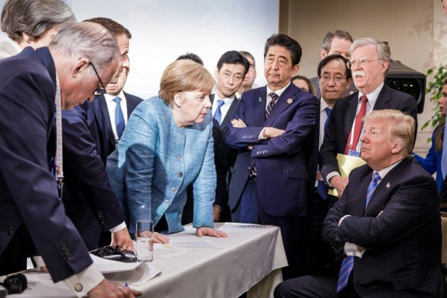 Trump face à Merkel: la photo "icônique" du G7 fait débat