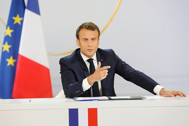 Macron demande de "travailler davantage" pour financer la baisse d'impôts