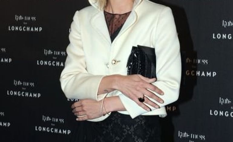 Kate Moss fait du bouche à bouche à George Michael