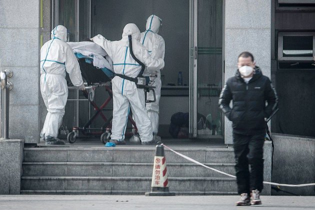 Virus en Chine: un troisième mort, l'épidémie gagne le pays