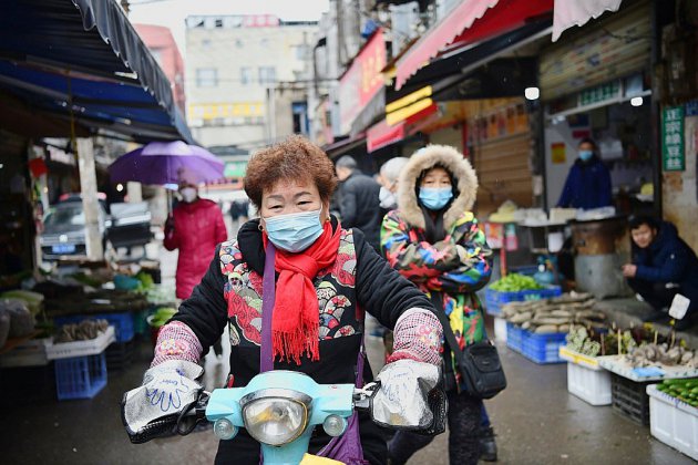 Chine: villes bouclées au coeur de l'épidémie, le bilan grimpe
