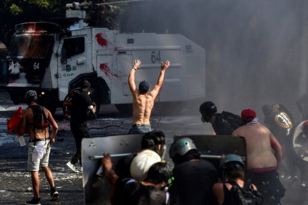 Chili: le président condamne les violences, appelle à voter au référendum
