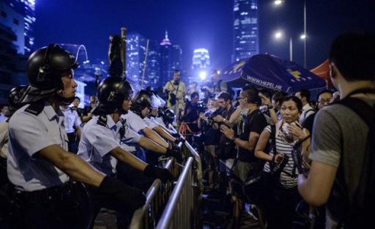 Hong Kong (AFP). Hong Kong: police et manifestants s'affrontent pour le contrôle des rues