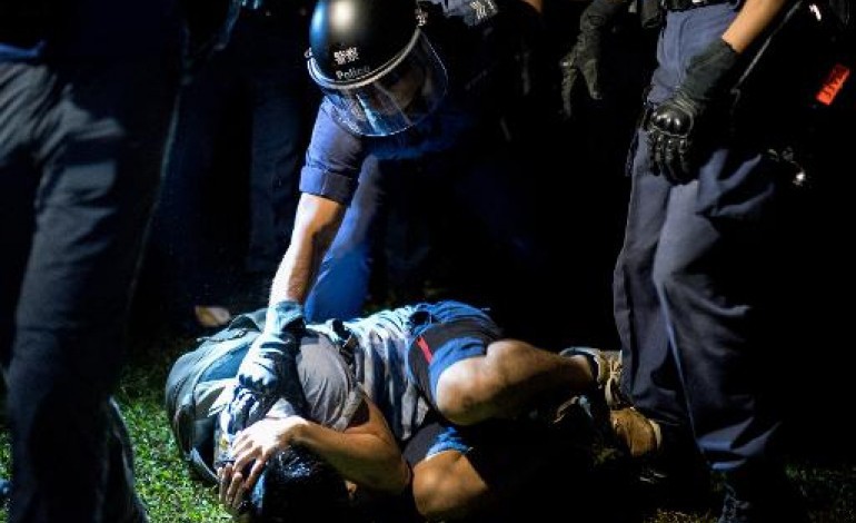 Hong Kong (AFP). Hong Kong: violents affrontements entre les manifestants et la police