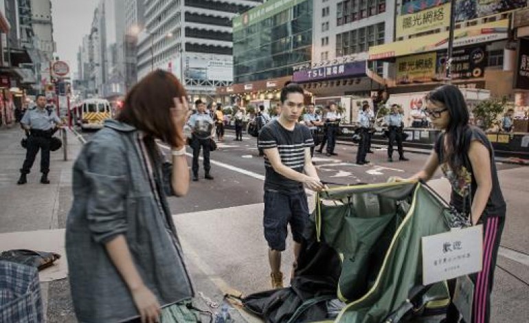 Hong Kong (AFP). Hong Kong: la police démantèle un site des manifestants prodémocratie 