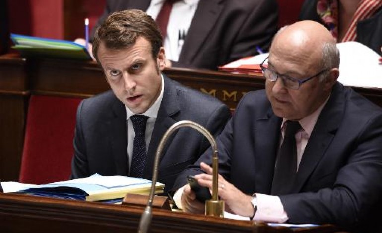 Berlin (AFP). Croissance: Macron et Sapin à Berlin pour réclamer des investissements 