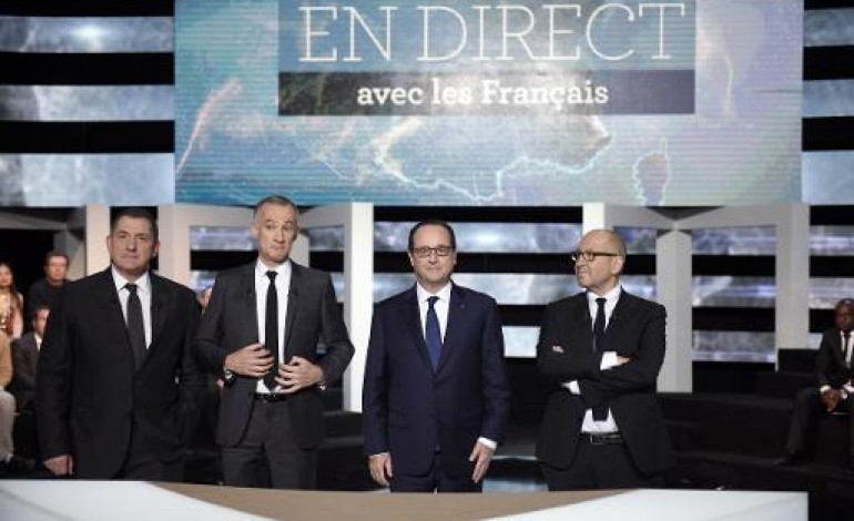 PARIS (AFP). Hollande chantre de l'optimisme et avare d'annonces, encore raté pour la presse