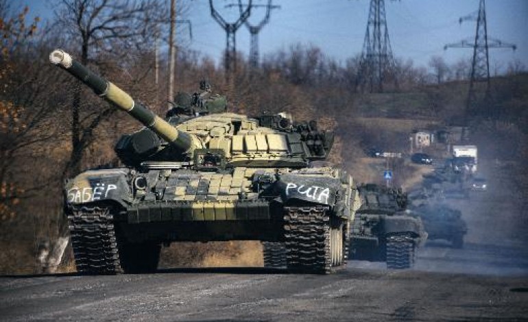 Kiev (AFP). L'Ukraine se prépare au combat, l'Otan confirme l'entrée de militaires russes